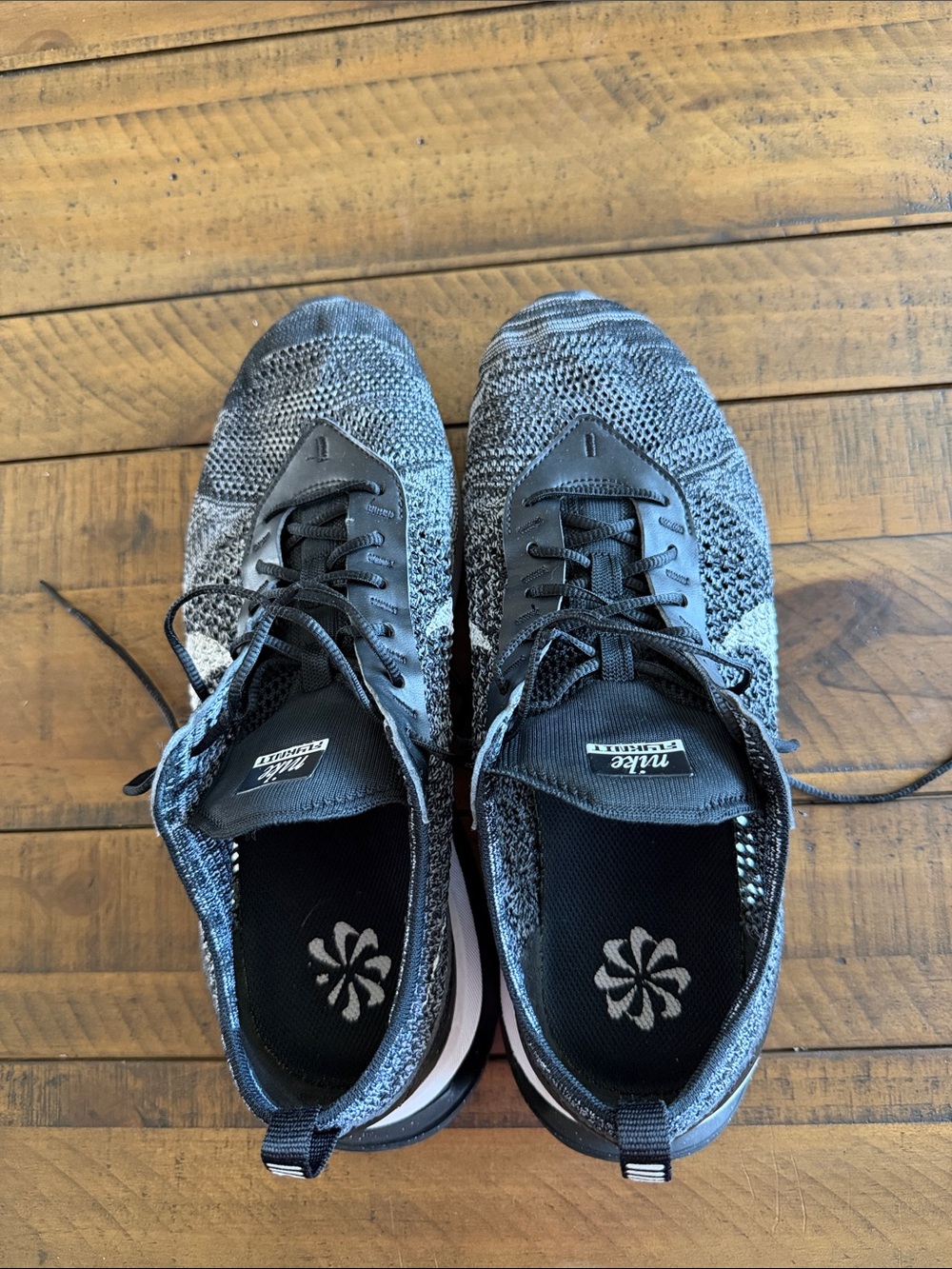 Nike Men’s Black and Gray Flyknit Athletic Shoes